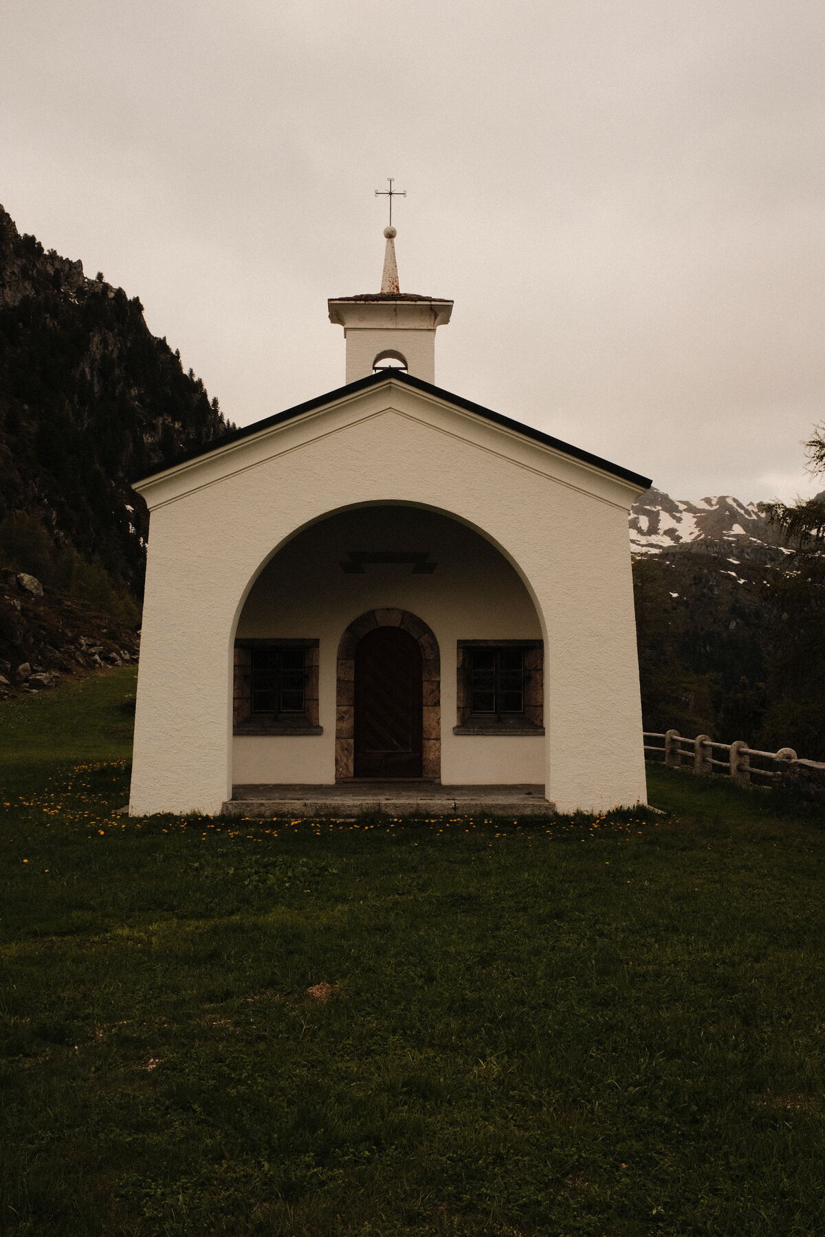 The white Chapelle Saint-Barthélémy, oldest chapel in Nendaz, near the Cleuson dam